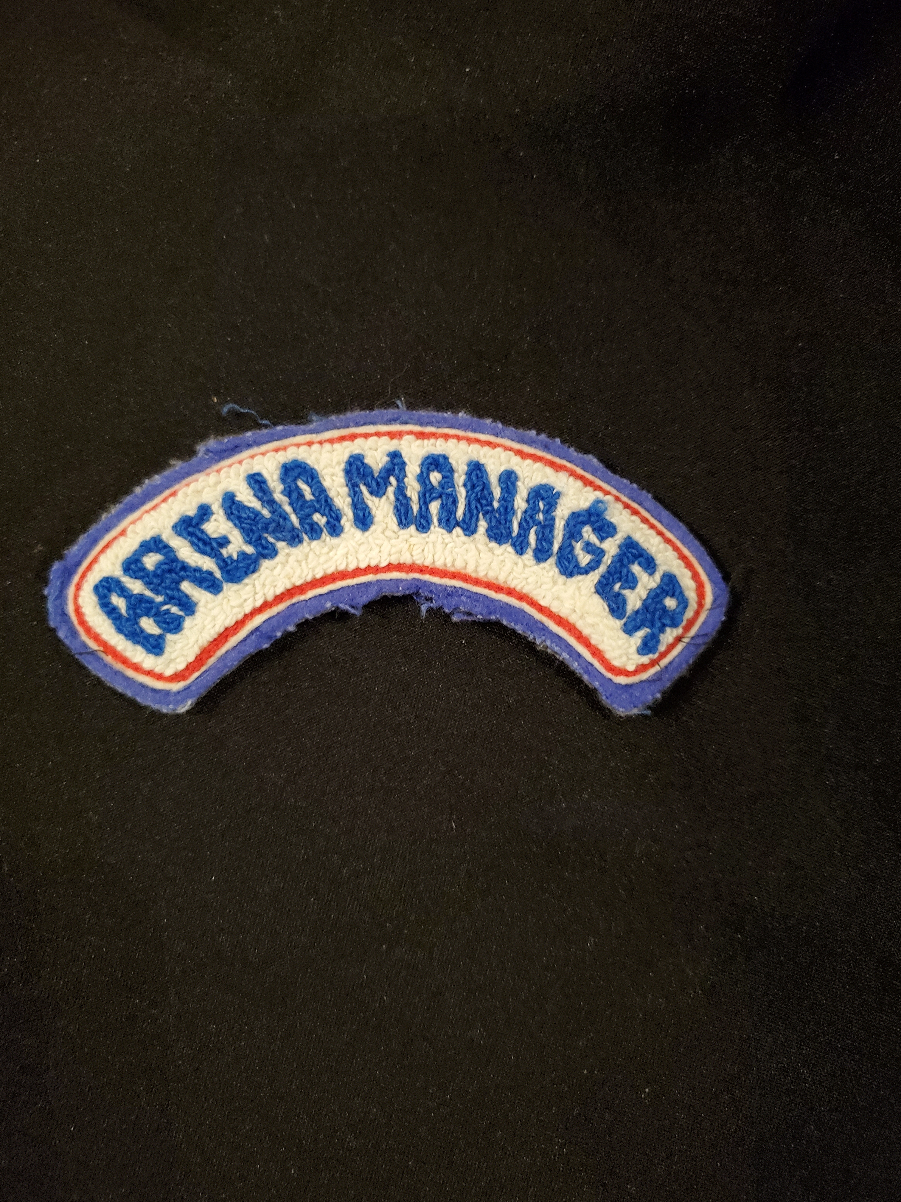 Neil Cane curved chenille crest 'Arena Manager'