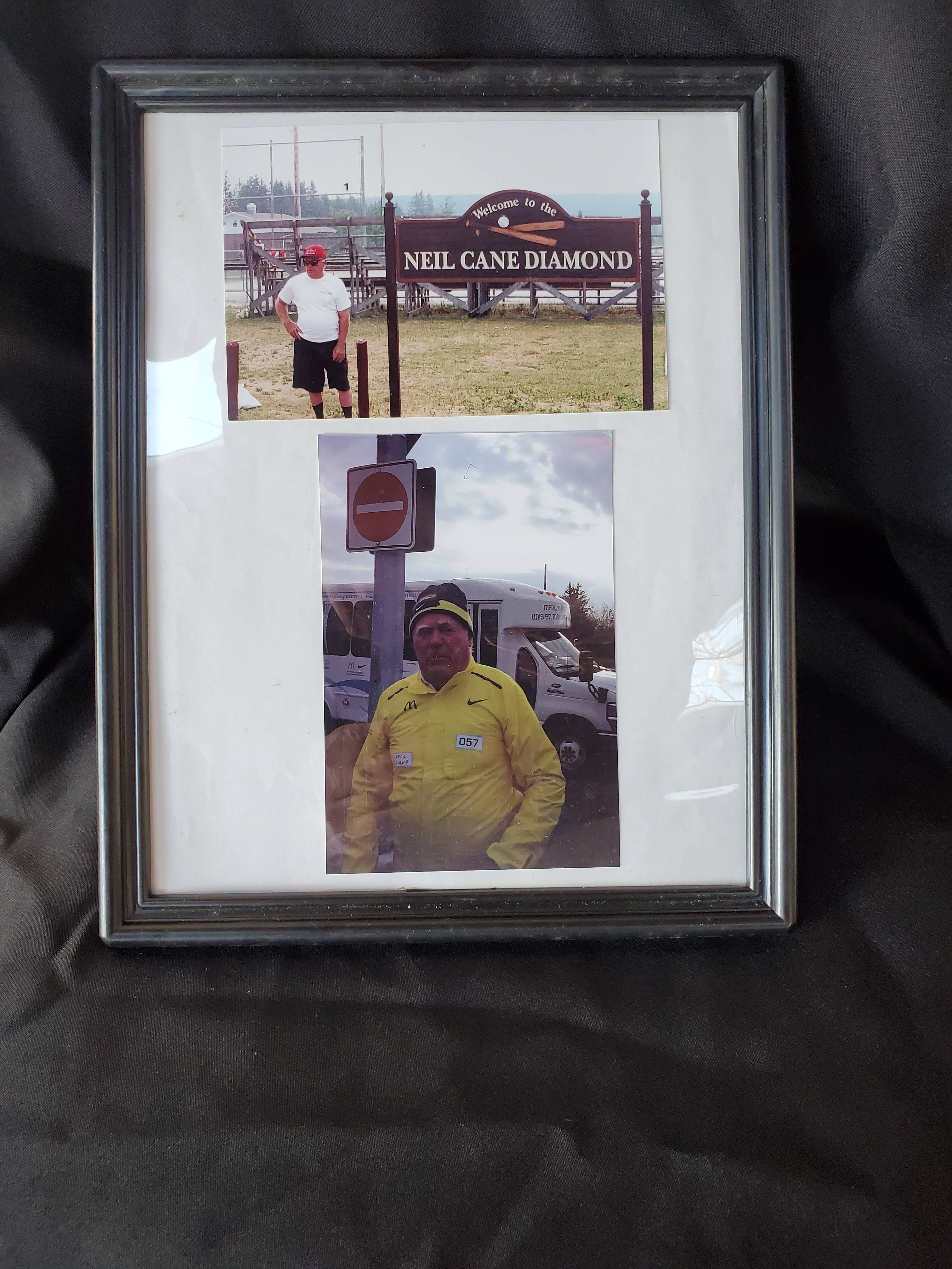 Neil Cane photos near diamond sign, at Hansen walk