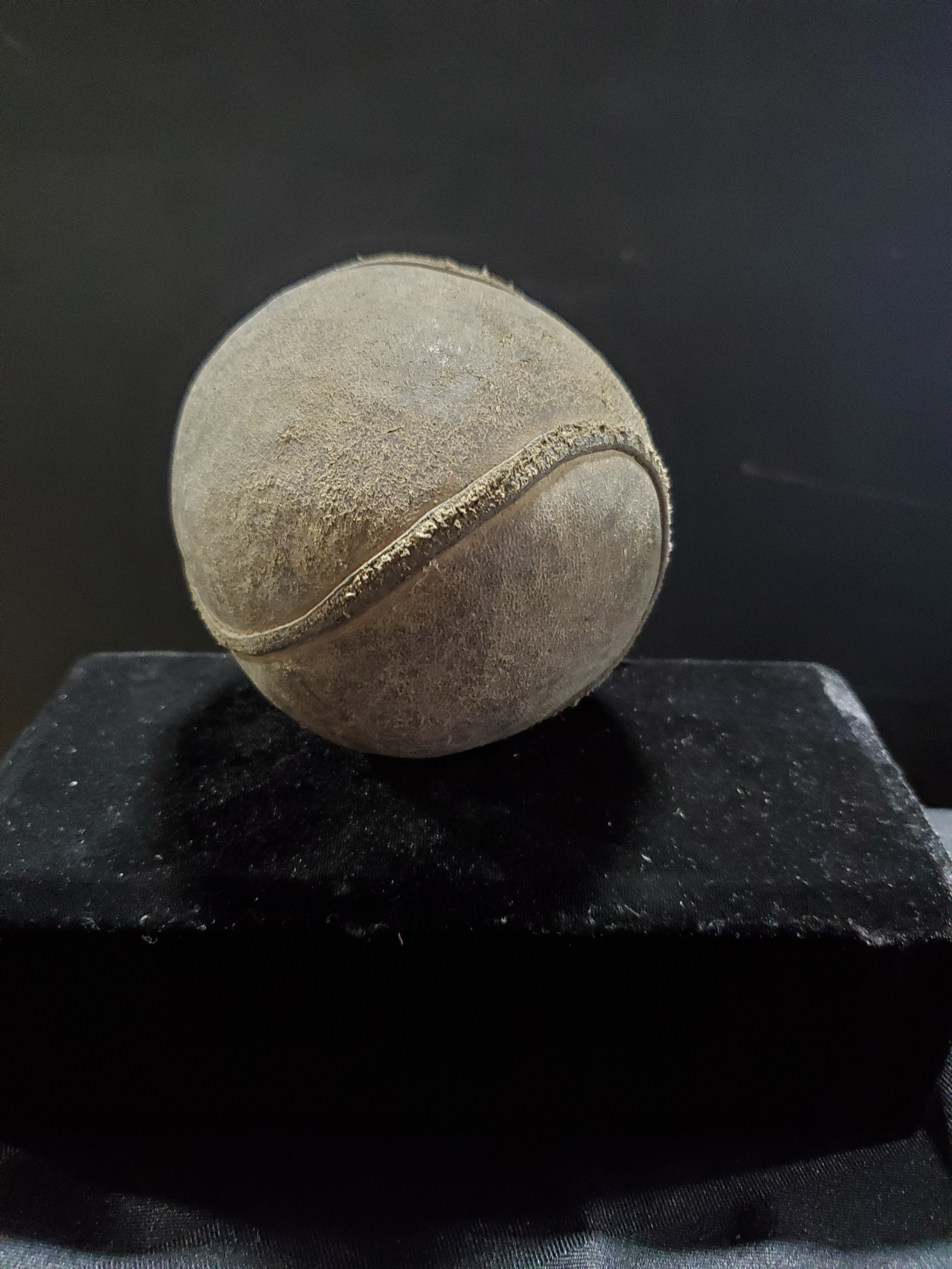 Older 13" leather covered softball