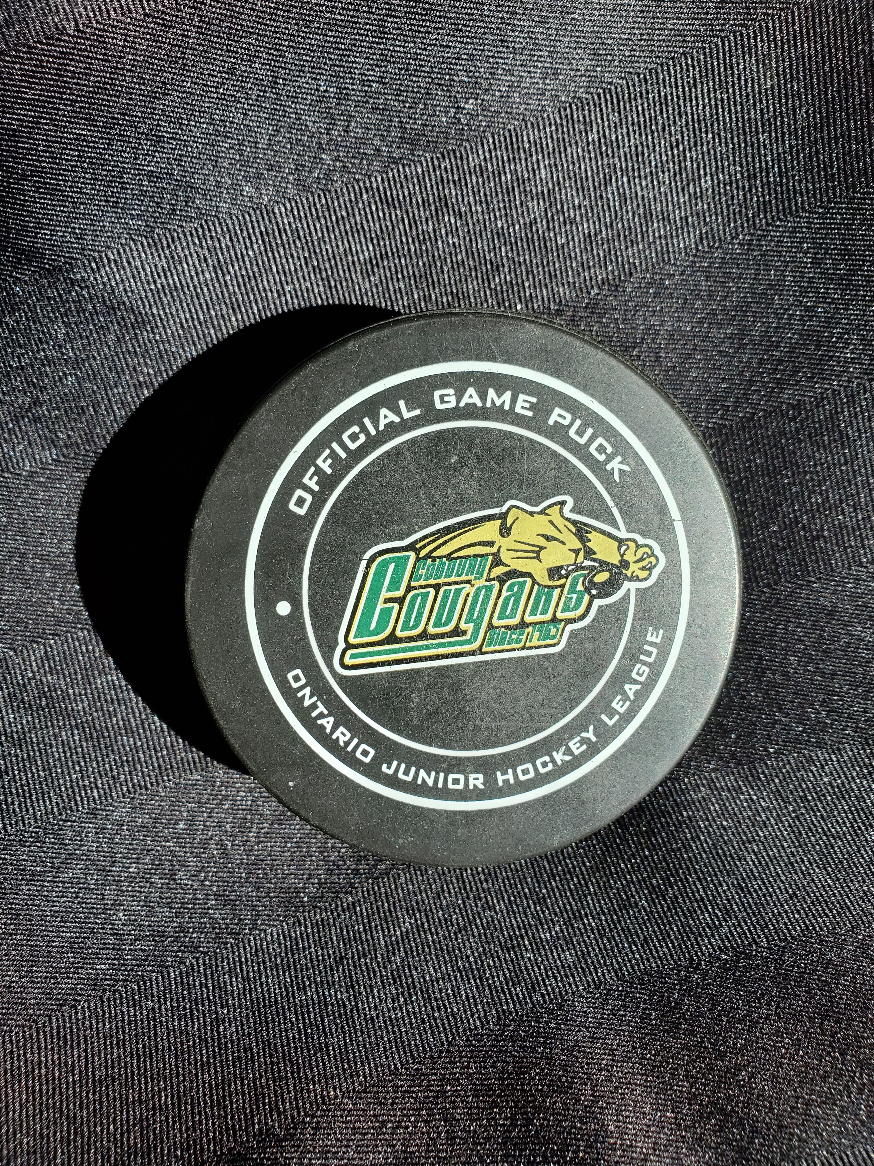 Cobourg Cougar game puck