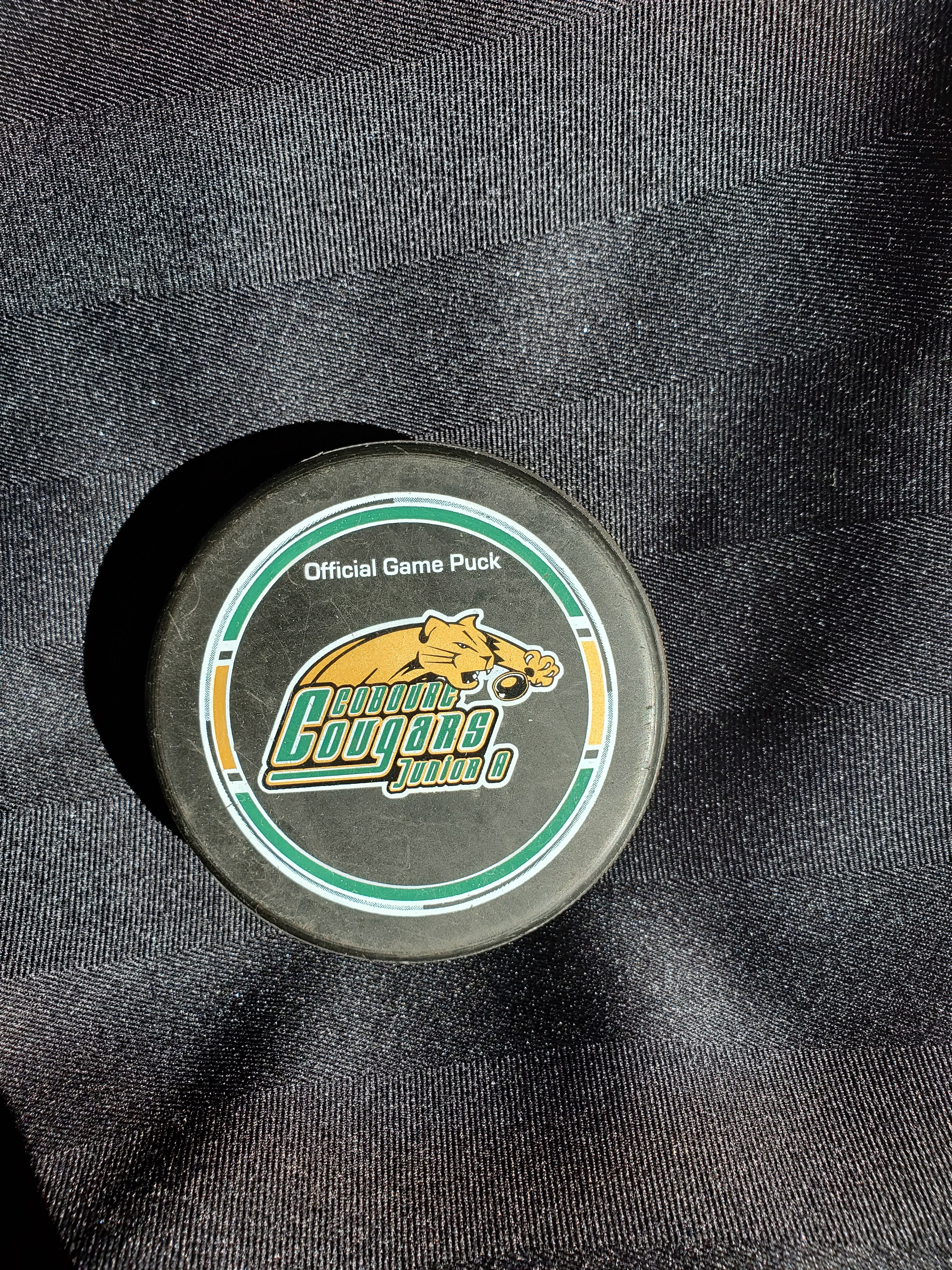 Cobourg Cougar game puck