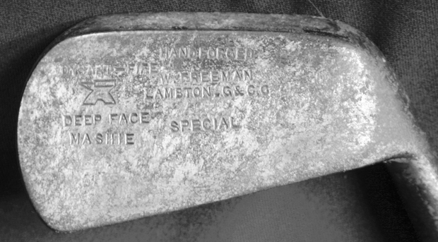 Golf club-metal head -wrapped wooden shaft