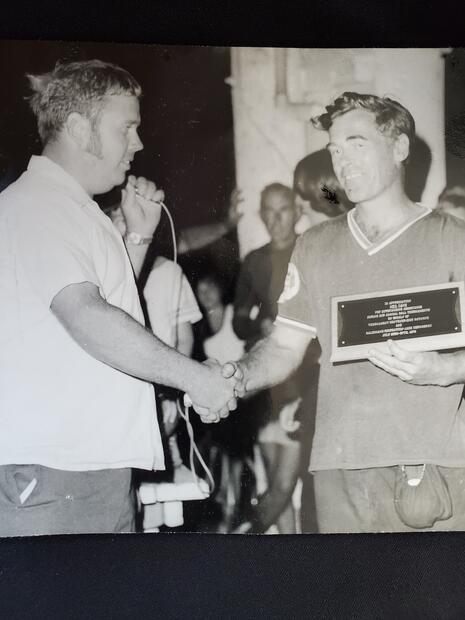 1978 Neil Cane photo Dick Raymond, Convenor Grafton Ball Tournament, presenting appreciation plaque to Neil