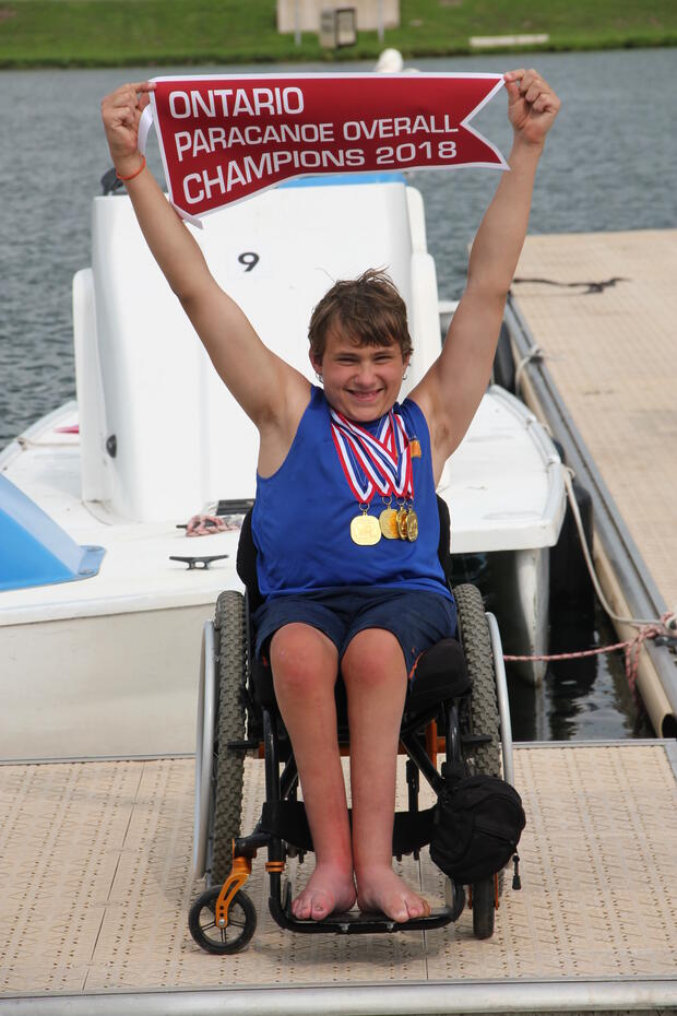2018 CDBCC Para-athlete Aidan Cameron w-burgee for Para-canoe