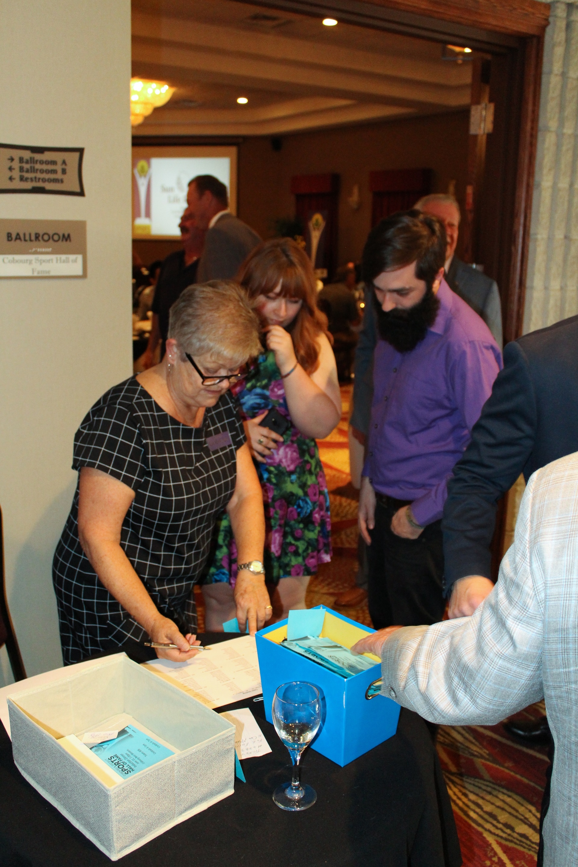 Liz Basinger taking tickets